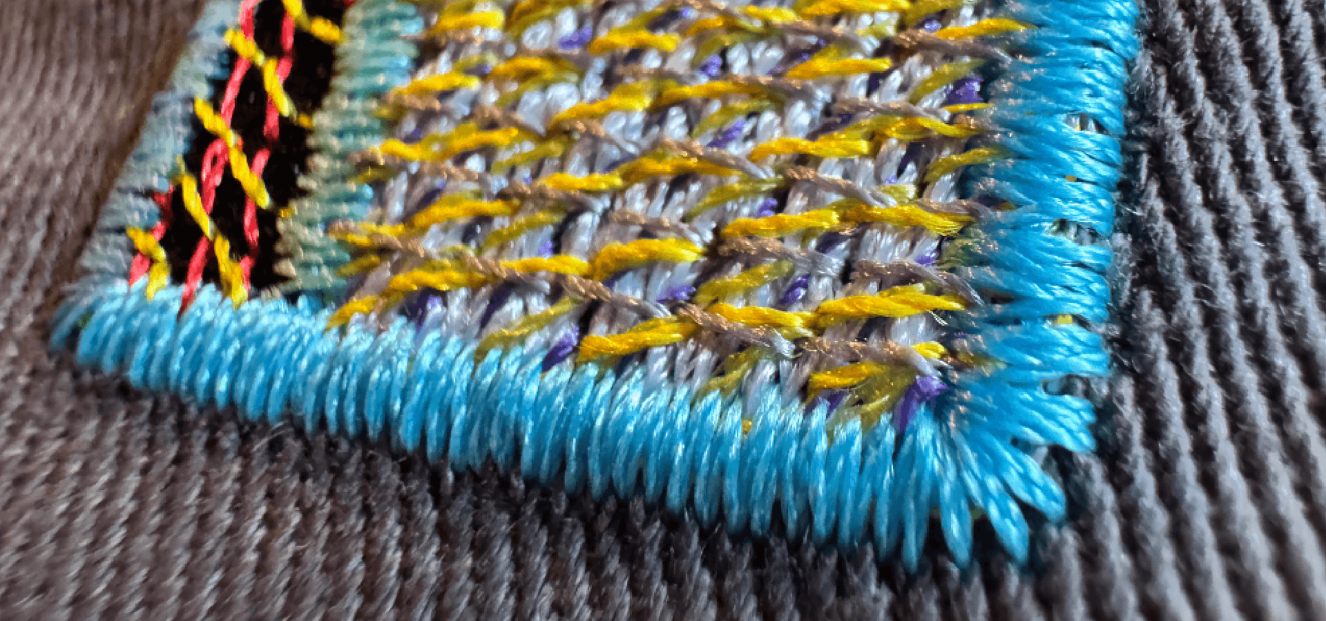 A close look at the individual stitches of a generative embroidery